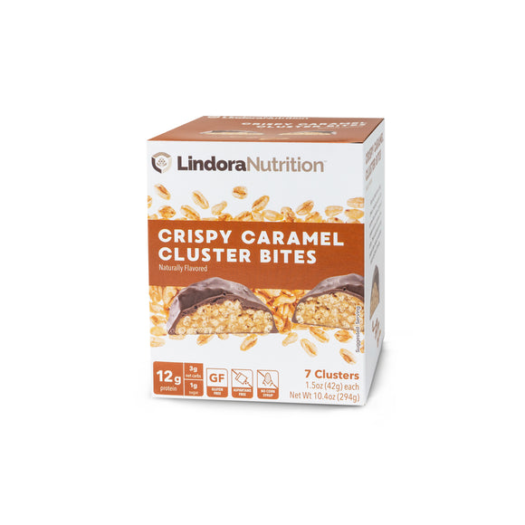 Crispy Caramel Cluster Bites Display Box. 7 Packets per Box. 12g Protein & 3g Net Carbohydrates. Gluten Free, Aspartame Free, Corn Syrup Free.